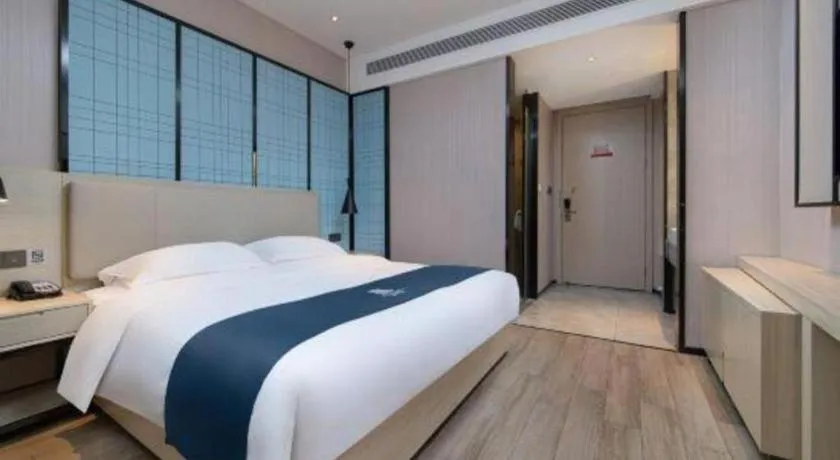 Bed in Echarm Hotel Hefei Binhu Exhibition Center