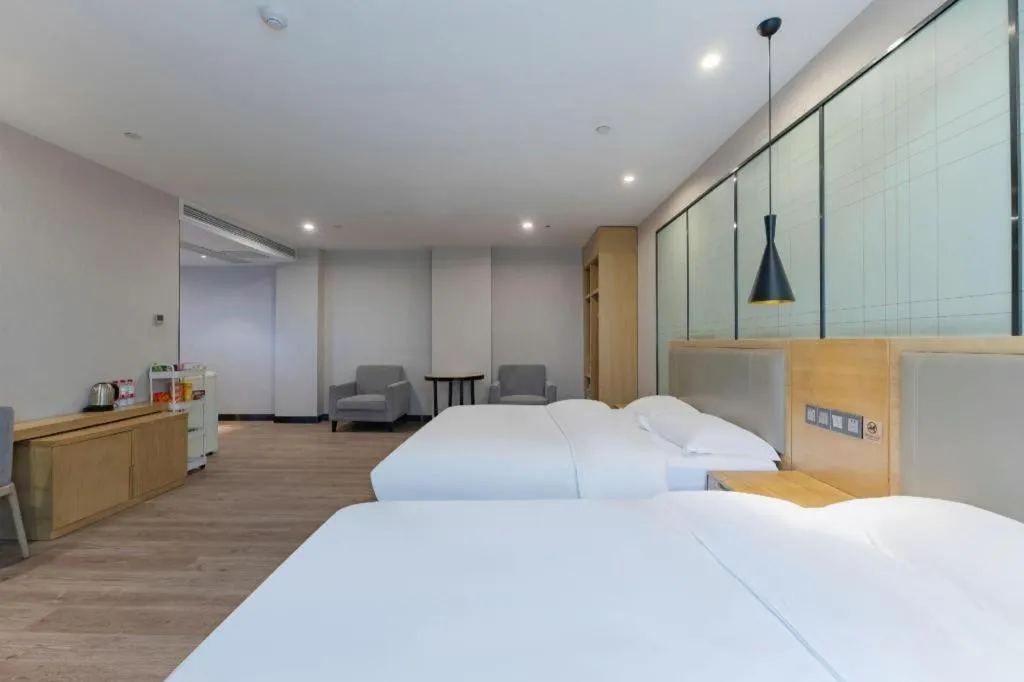 Bed in Echarm Hotel Hefei Binhu Exhibition Center