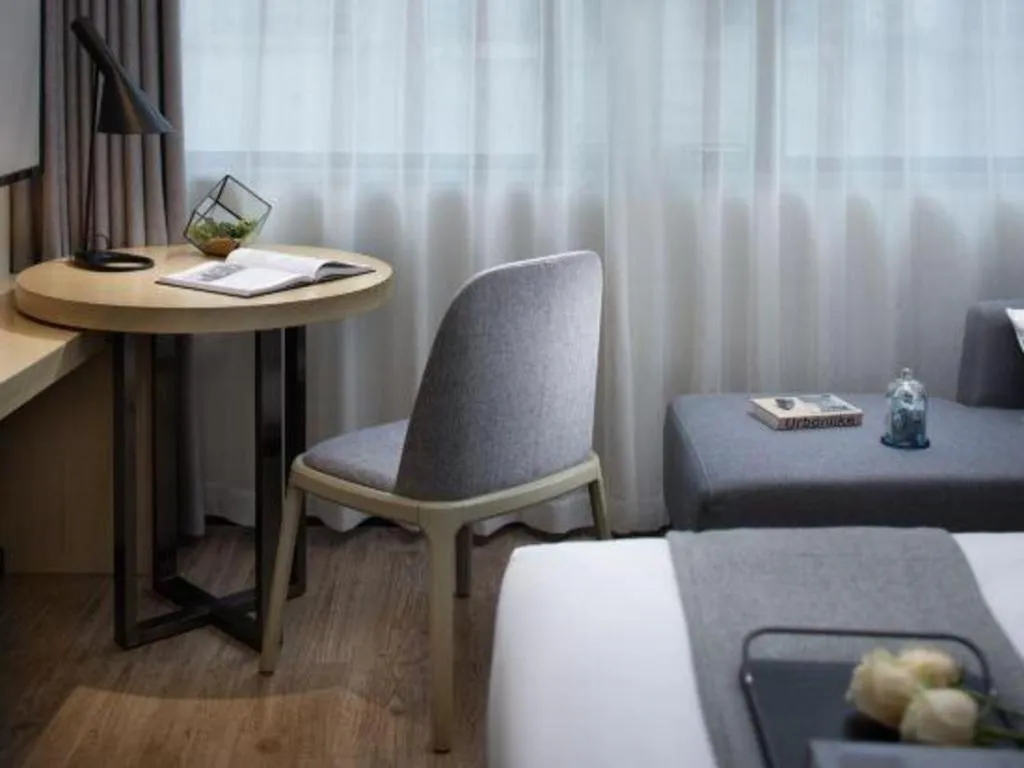 Bed in Echarm Hotel Hefei Binhu Exhibition Center