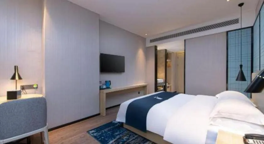 Bed in Echarm Hotel Hefei Binhu Exhibition Center