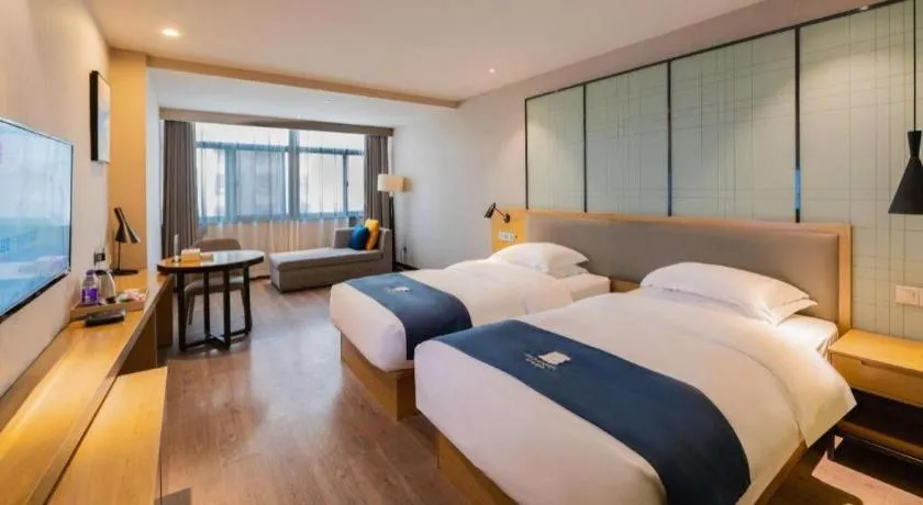 Bed in Echarm Hotel Hefei Binhu Exhibition Center