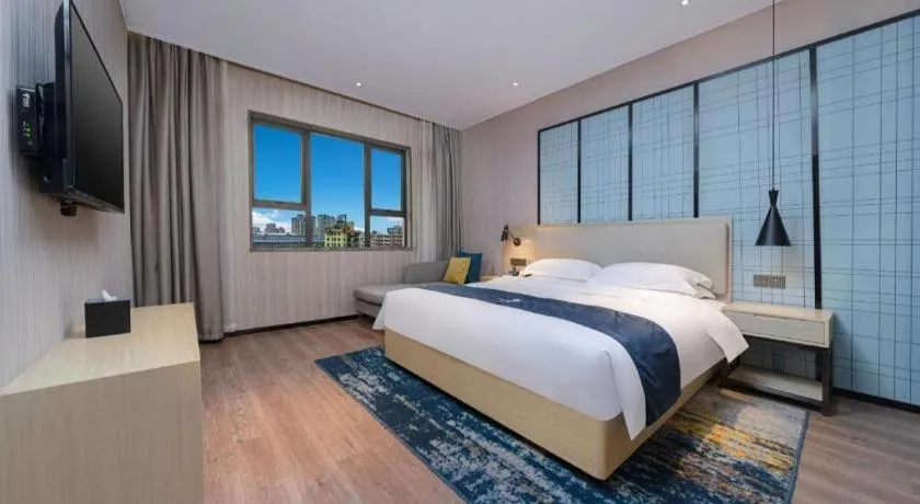 Bed in Echarm Hotel Hefei Binhu Exhibition Center