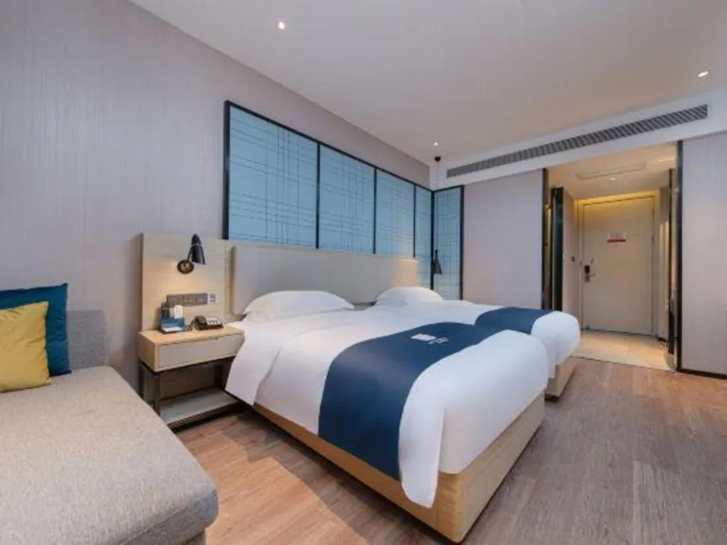 Bed in Echarm Hotel Hefei Binhu Exhibition Center