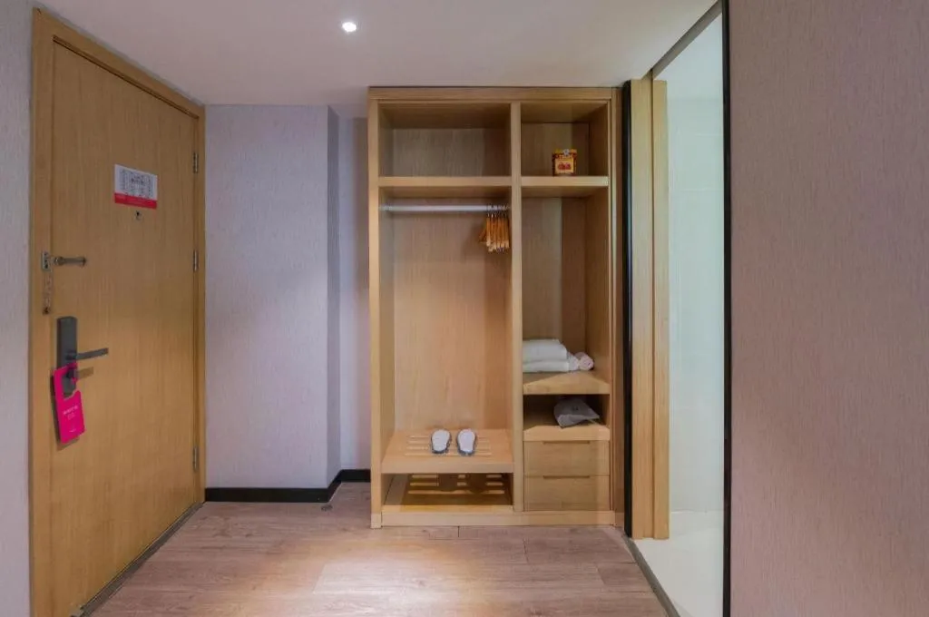 Bed in Echarm Hotel Hefei Binhu Exhibition Center