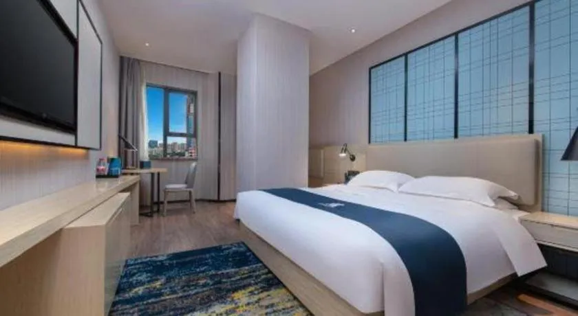 Bed in Echarm Hotel Hefei Binhu Exhibition Center