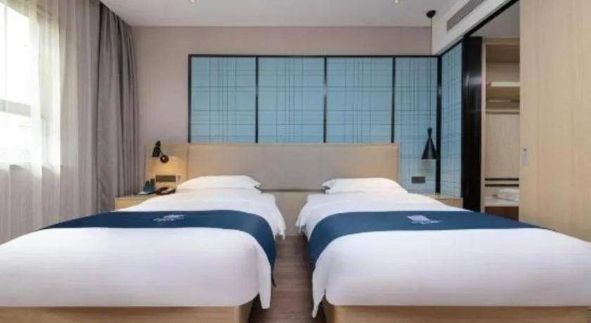 Bed in Echarm Hotel Hefei Binhu Exhibition Center