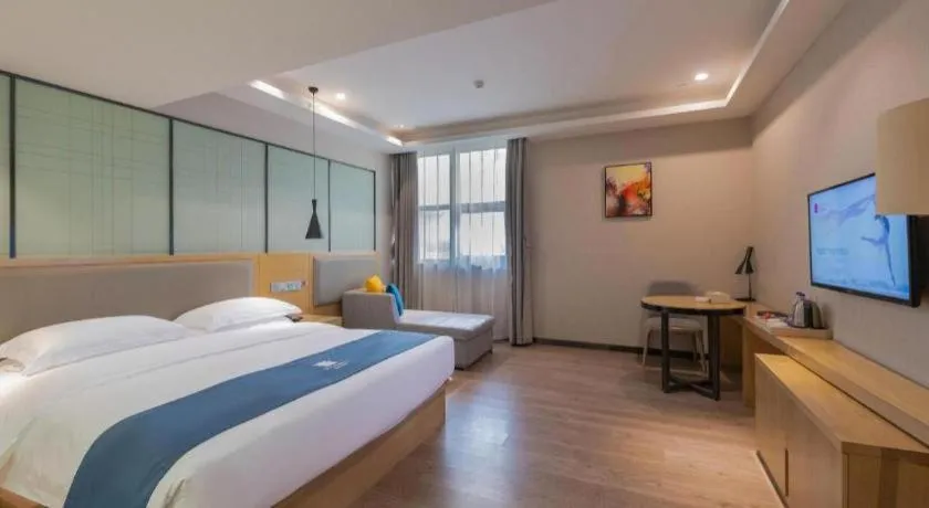 Bed in Echarm Hotel Hefei Binhu Exhibition Center