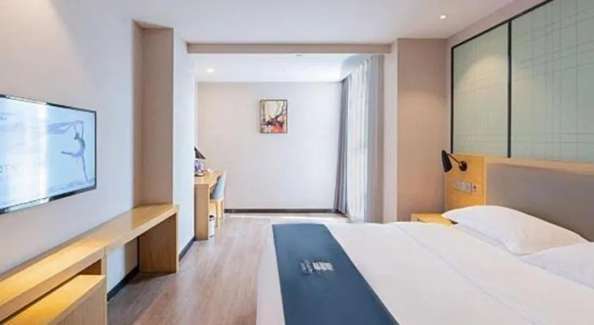 Bed in Echarm Hotel Hefei Binhu Exhibition Center