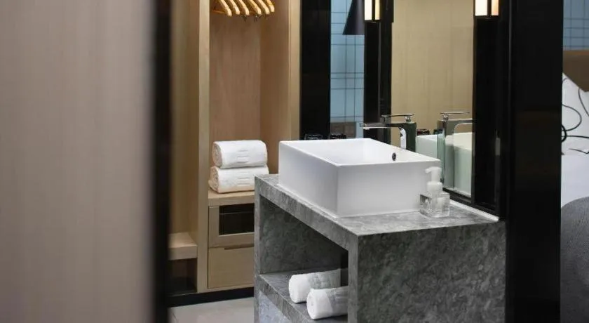 Bed in Echarm Hotel Hefei Binhu Exhibition Center