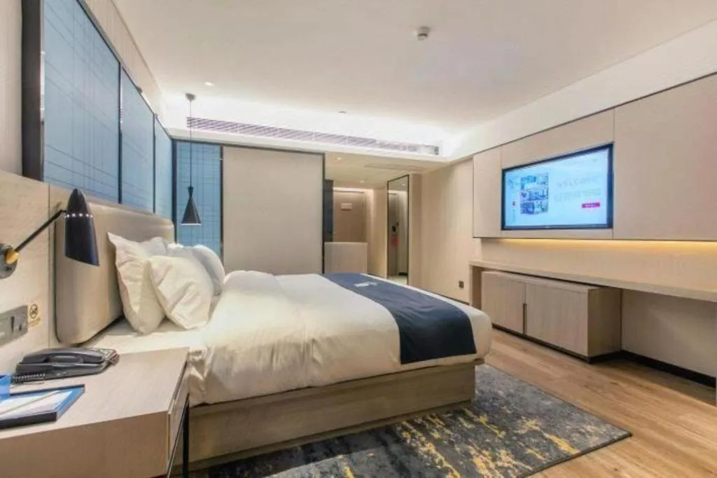 Bed in Echarm Hotel Hefei Binhu Exhibition Center