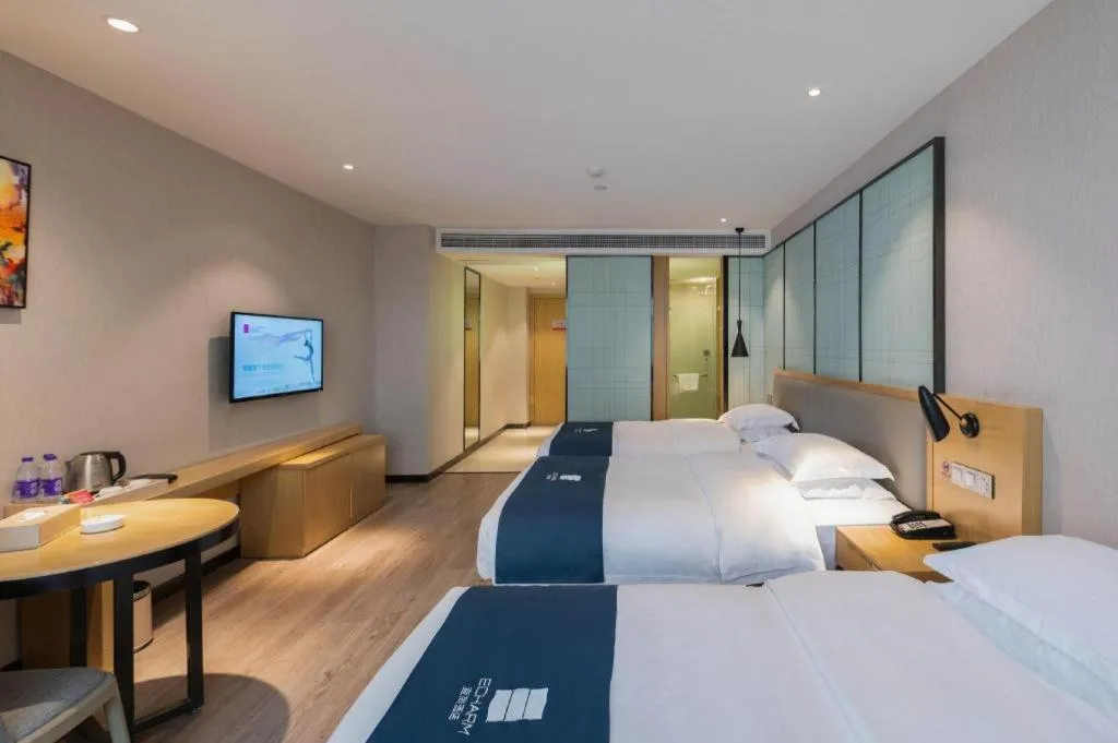 Bed in Echarm Hotel Hefei Binhu Exhibition Center