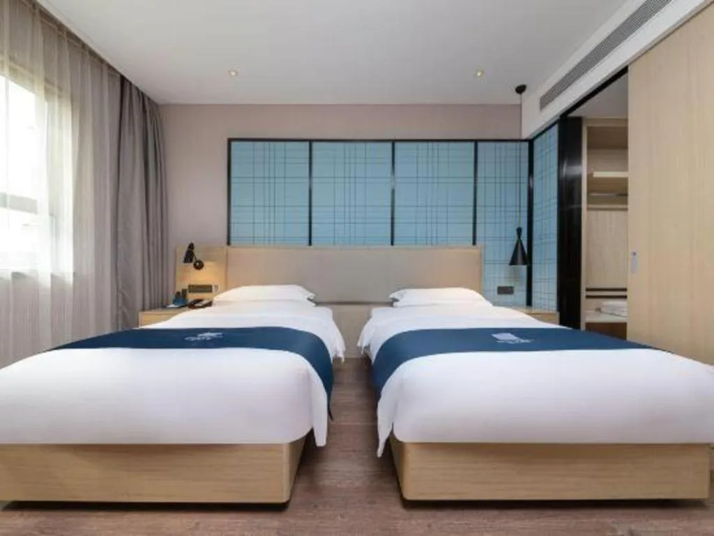 Bed in Echarm Hotel Hefei Binhu Exhibition Center