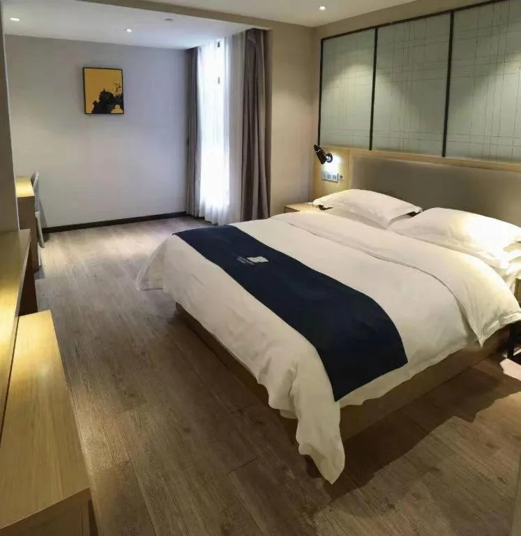 Bed in Echarm Hotel Hefei Binhu Exhibition Center