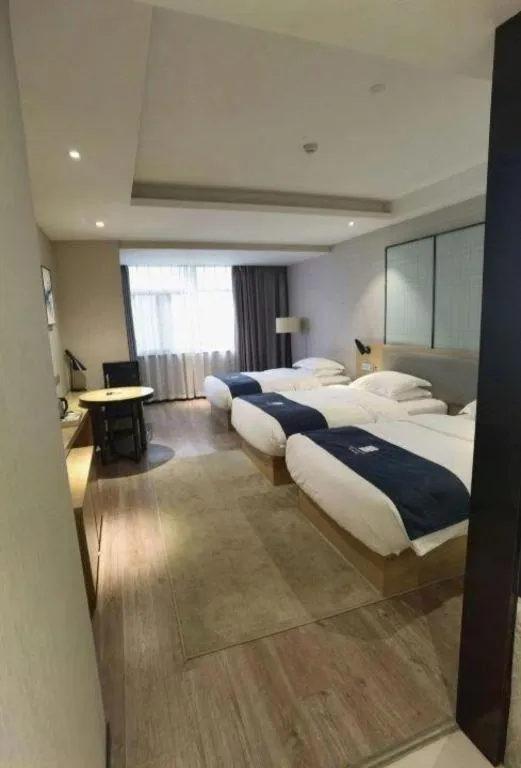 Bed in Echarm Hotel Hefei Binhu Exhibition Center