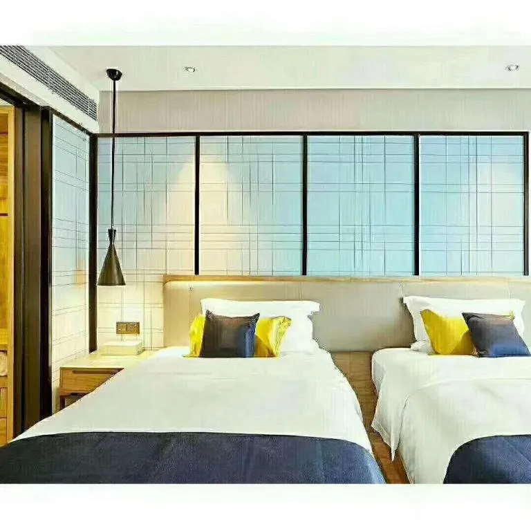 Bed in Echarm Hotel Hefei Binhu Exhibition Center