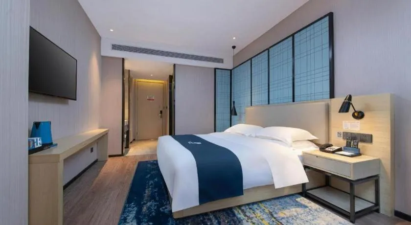 Bed in Echarm Hotel Hefei Binhu Exhibition Center