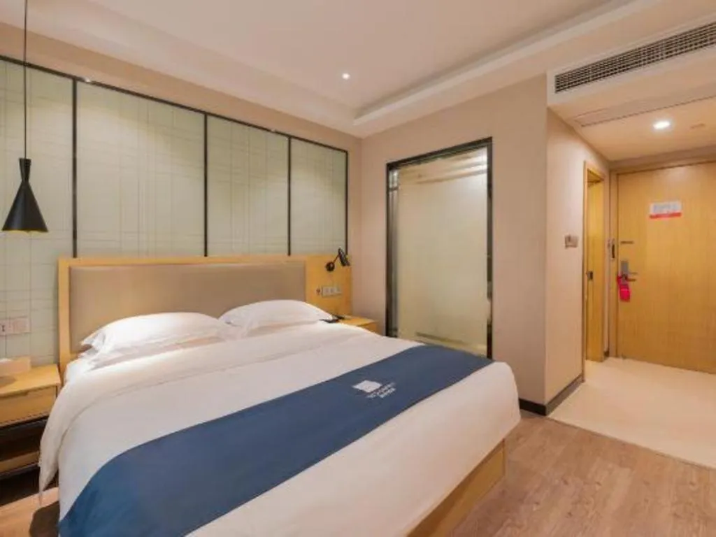 Bed in Echarm Hotel Hefei Binhu Exhibition Center