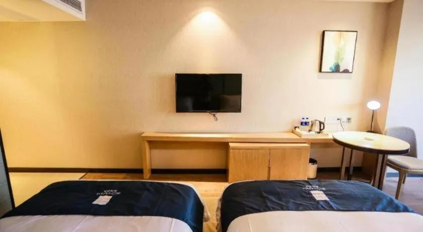 Bed in Echarm Hotel Hefei Binhu Exhibition Center