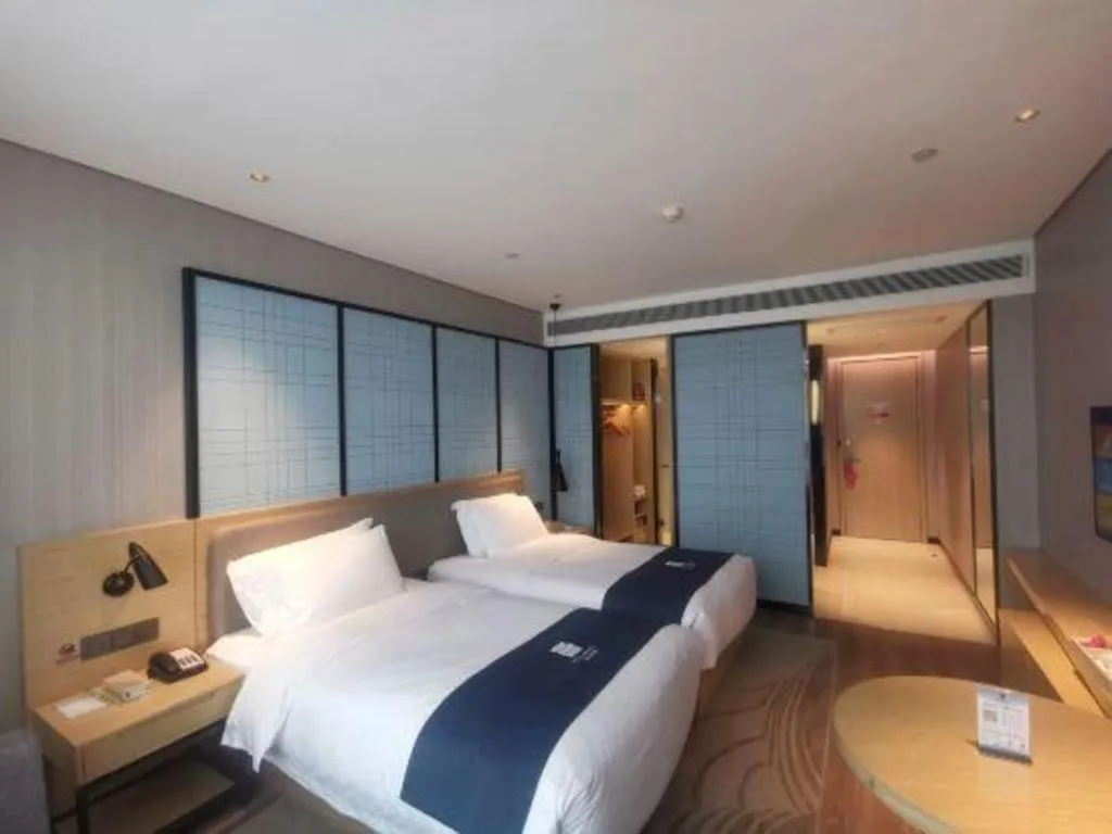 Bed in Echarm Hotel Hefei Binhu Exhibition Center