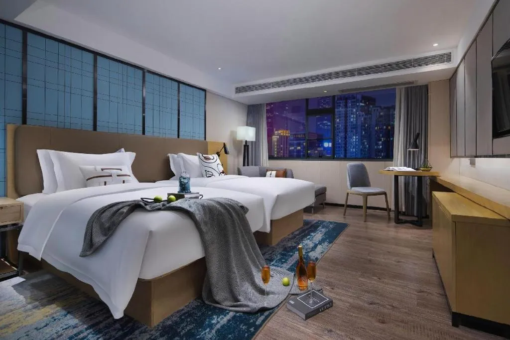 Bed in Echarm Hotel Hefei Binhu Exhibition Center