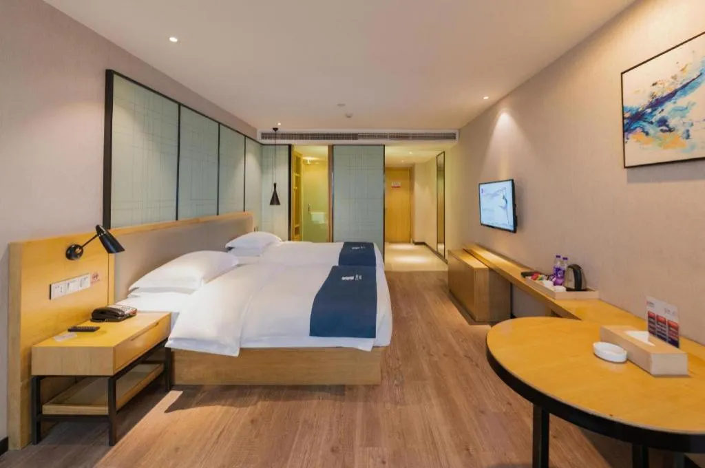 Bed in Echarm Hotel Hefei Binhu Exhibition Center