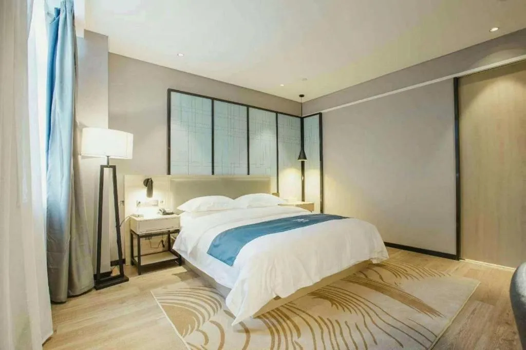 Bed in Echarm Hotel Hefei Binhu Exhibition Center