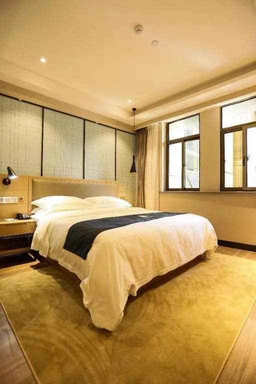 Bed in Echarm Hotel Hefei Binhu Exhibition Center