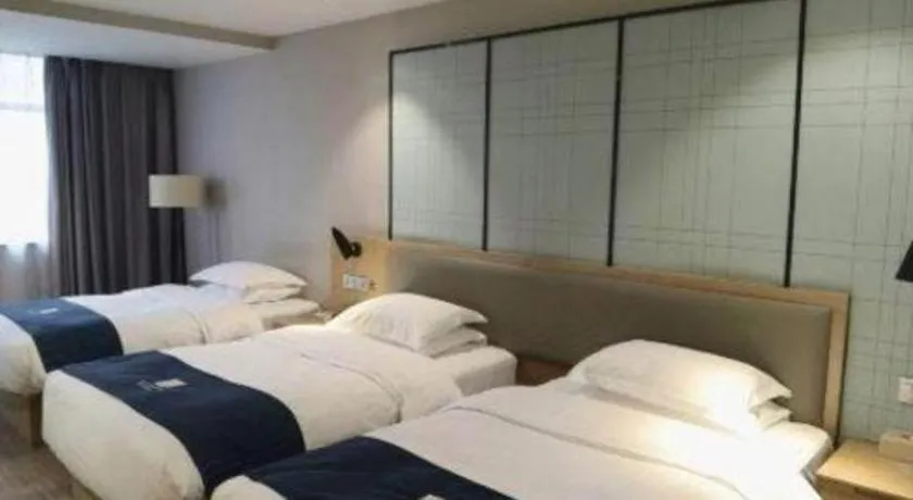 Bed in Echarm Hotel Hefei Binhu Exhibition Center