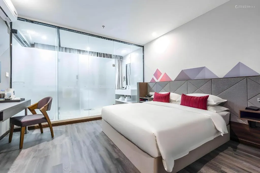 Bed in Borrman Hotel Wuxi Hubin Business Street
