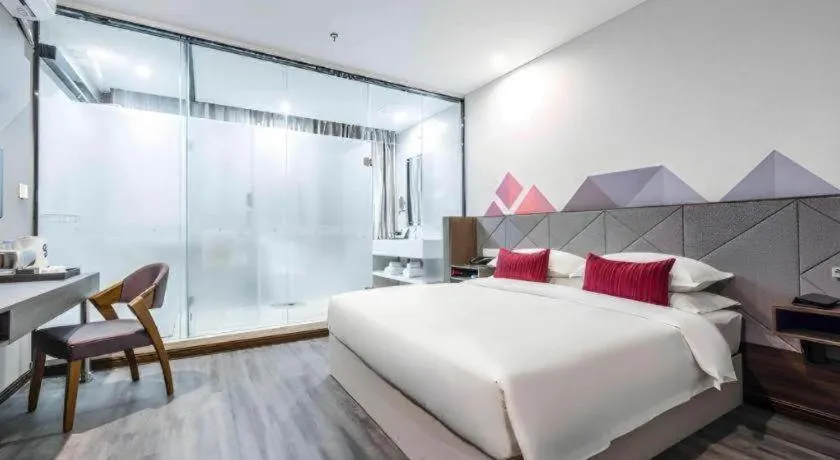 Bed in Borrman Hotel Wuxi Hubin Business Street