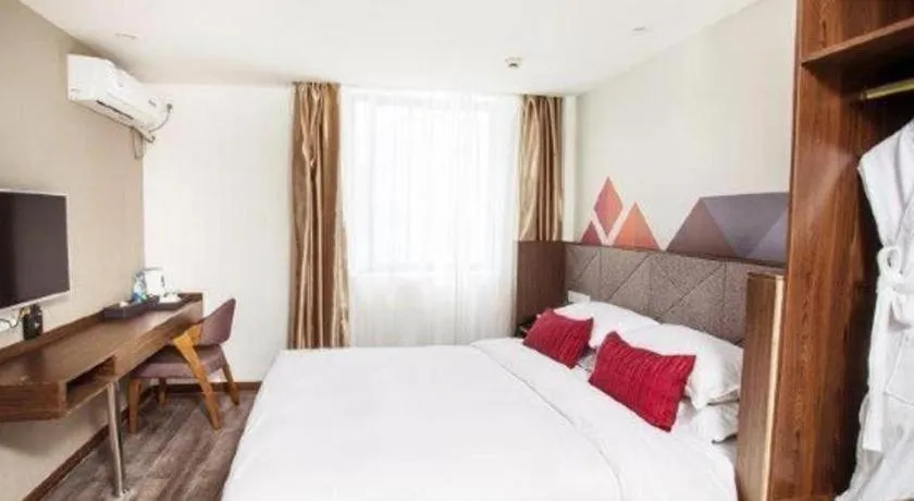 Bed in Borrman Hotel Wuxi Hubin Business Street