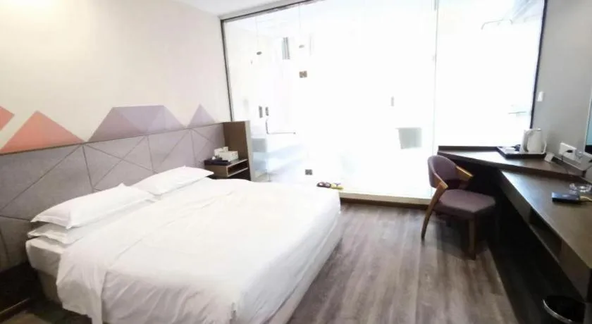 Bed in Borrman Hotel Wuxi Hubin Business Street