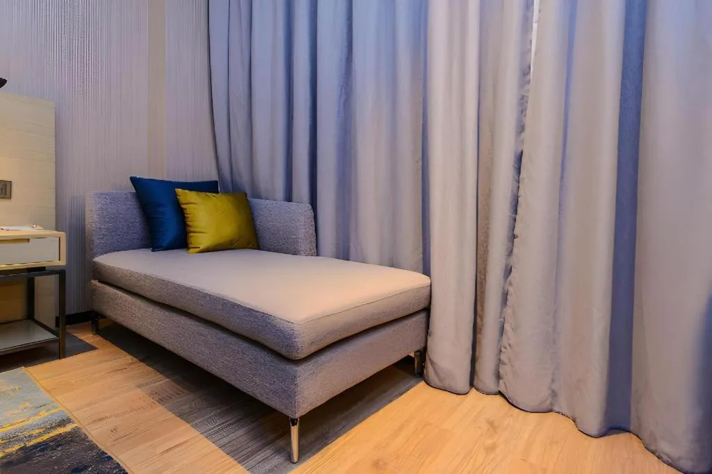 Bed in Echarm Hotel Guizhou Xingyi Jushan Avenue