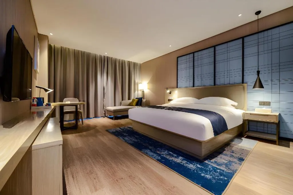 Bed in Echarm Hotel Guizhou Xingyi Jushan Avenue