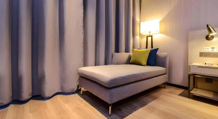 Bed in Echarm Hotel Guizhou Xingyi Jushan Avenue