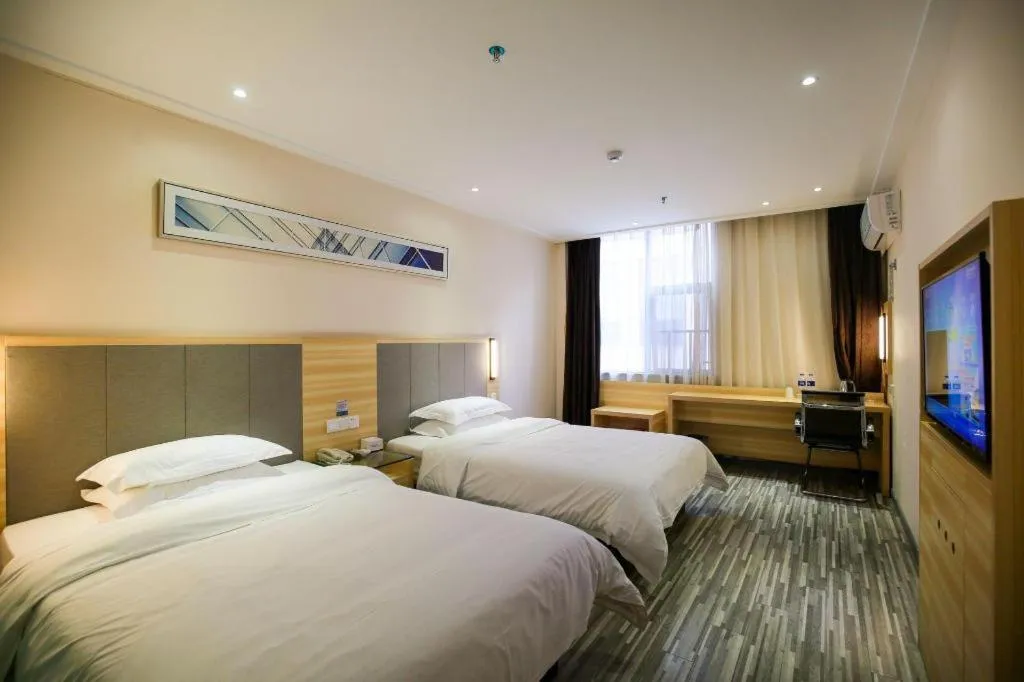 Bed in City Comfort Inn Hotel Zhangjiajie Railway Station Tianmen Mountain Cableway Station