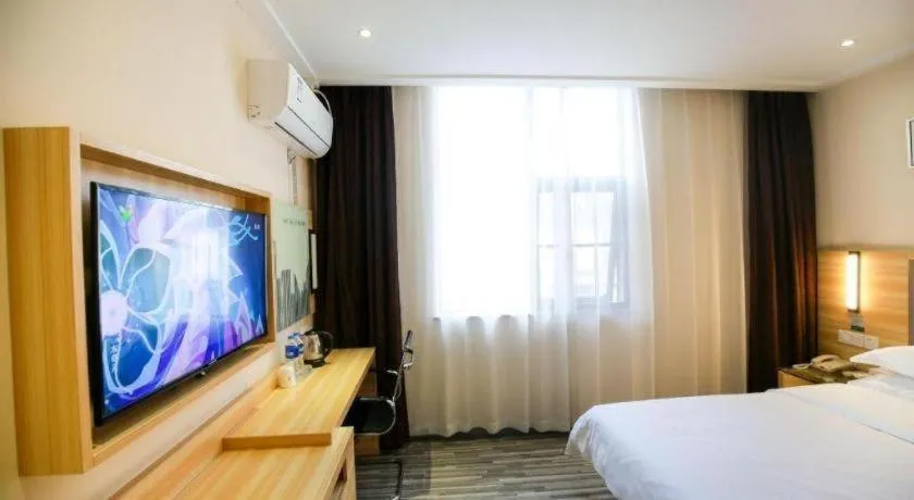 Bed in City Comfort Inn Hotel Zhangjiajie Railway Station Tianmen Mountain Cableway Station