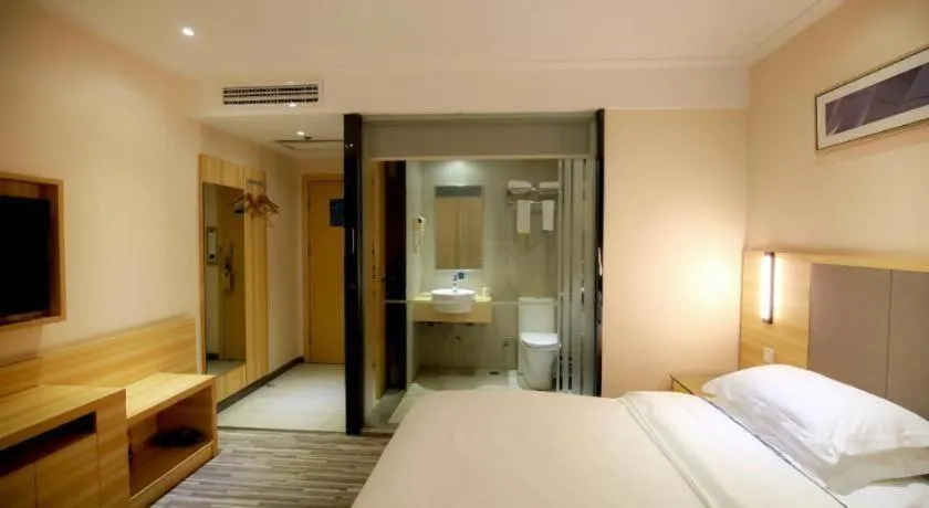 Bed in City Comfort Inn Hotel Zhangjiajie Railway Station Tianmen Mountain Cableway Station