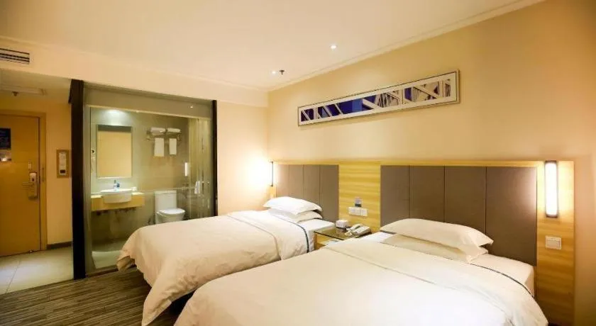 Bed in City Comfort Inn Hotel Zhangjiajie Railway Station Tianmen Mountain Cableway Station