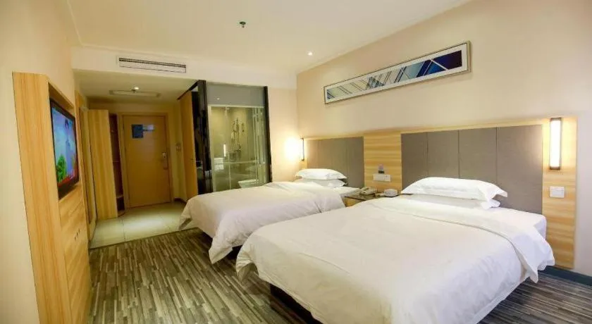 Bed in City Comfort Inn Hotel Zhangjiajie Railway Station Tianmen Mountain Cableway Station