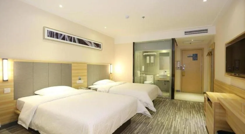 Bed in City Comfort Inn Hotel Zhangjiajie Railway Station Tianmen Mountain Cableway Station