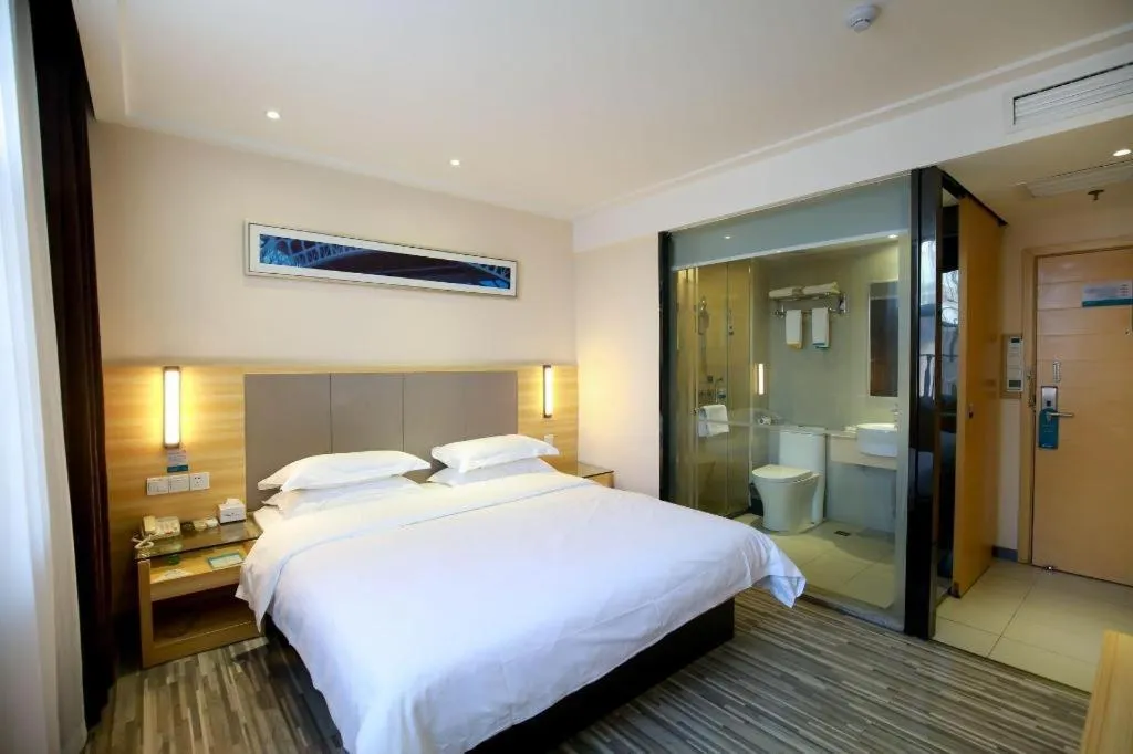 Bed in City Comfort Inn Hotel Zhangjiajie Railway Station Tianmen Mountain Cableway Station