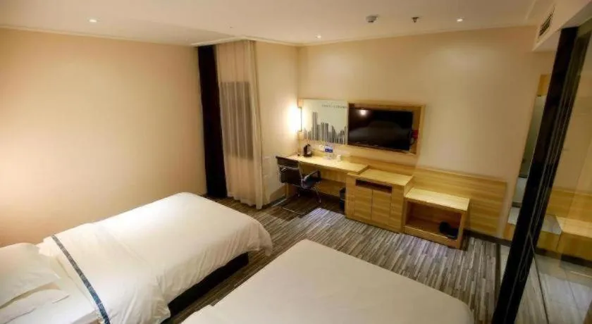 Bed in City Comfort Inn Hotel Zhangjiajie Railway Station Tianmen Mountain Cableway Station