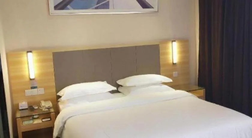 Bed in City Comfort Inn Hotel Zhangjiajie Railway Station Tianmen Mountain Cableway Station