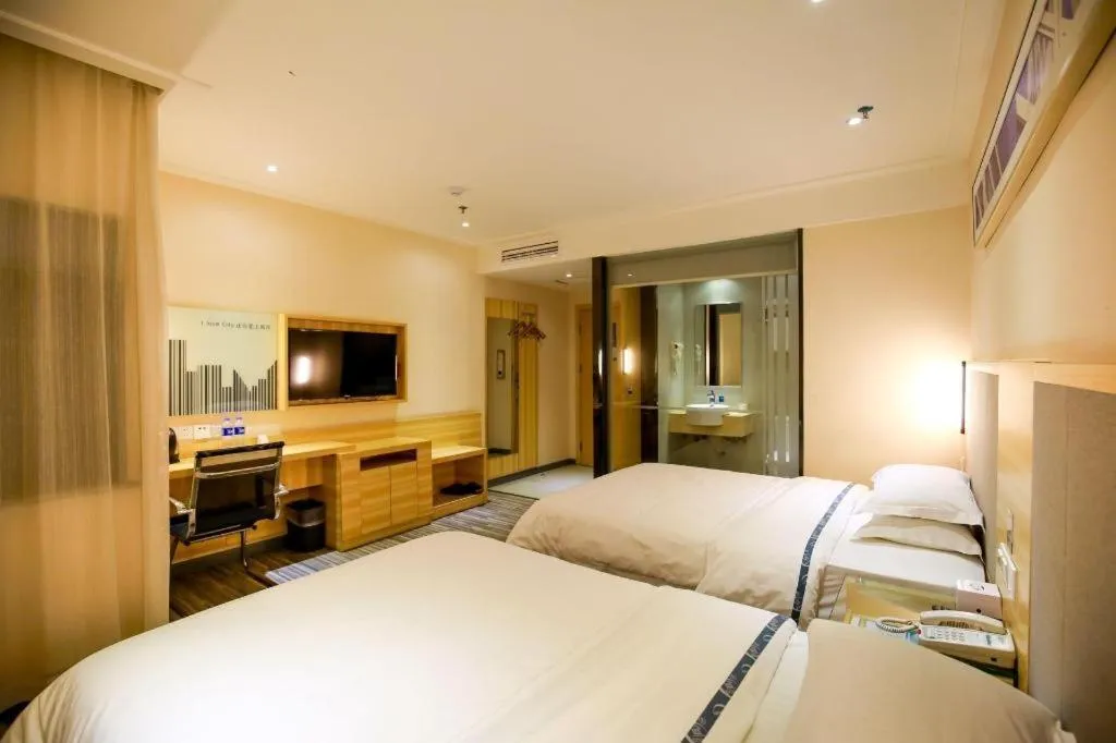 Bed in City Comfort Inn Hotel Zhangjiajie Railway Station Tianmen Mountain Cableway Station