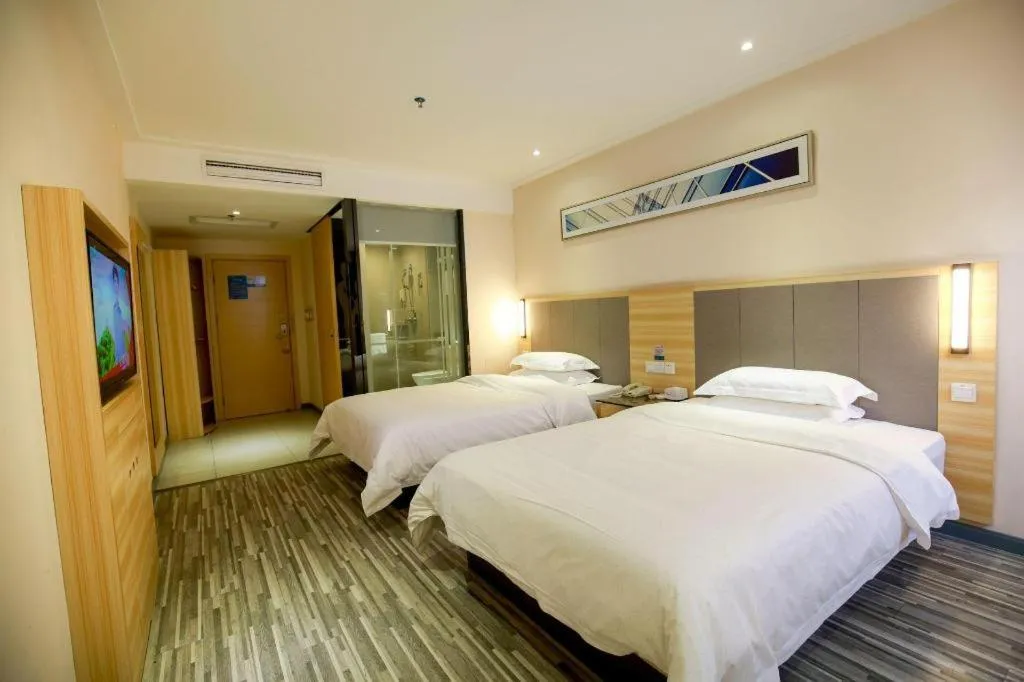 Bed in City Comfort Inn Hotel Zhangjiajie Railway Station Tianmen Mountain Cableway Station