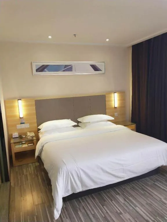 Bed in City Comfort Inn Hotel Zhangjiajie Railway Station Tianmen Mountain Cableway Station