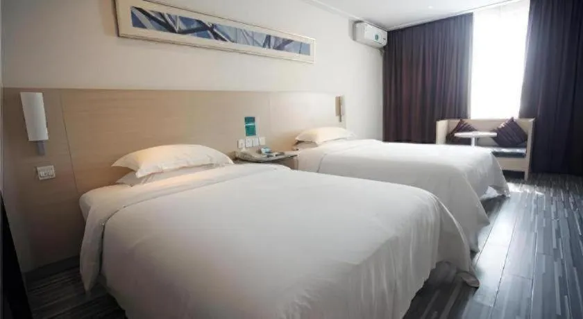 Bed in City Comfort Inn Xianning Wenquan Road Walmart Plaza