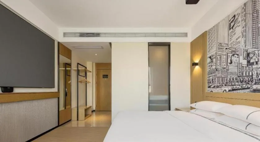 Bed in City Comfort Inn Yuzhou Yuwang Square