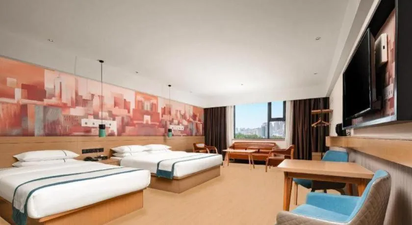 Bed in City Comfort Inn Yuzhou Yuwang Square